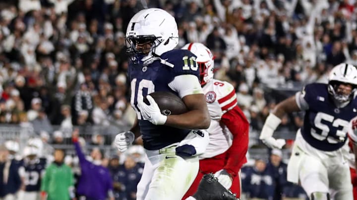 Penn State Nittany Lions running back Nicholas Singleton runs the ball into the end zone for a touchdown during the second quarter against the Nebraska Cornhuskers at Beaver Stadium.