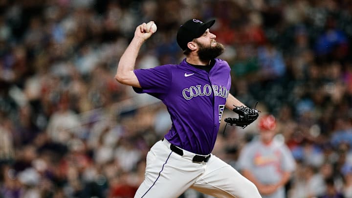 Jul 21, 2025; Denver, Colorado, USA; Colorado Rockies relief pitcher Jake Bird (59) pitches in the ninth inning against the St. Louis Cardinals at Coors Field. 