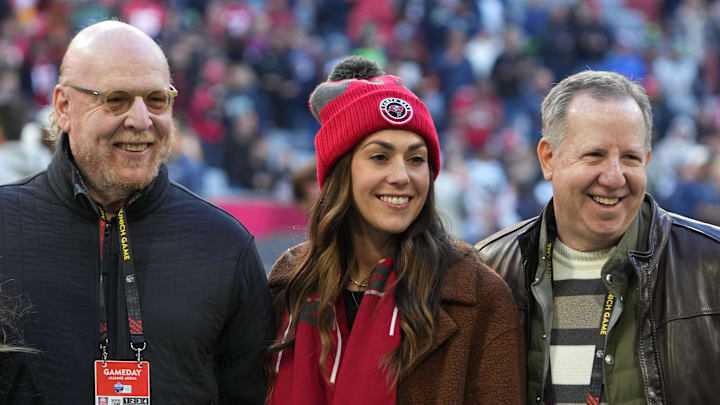Tampa Bay Buccaneers owners Avrum Avie Glazier (left), Darcie Glazer Kassewitz (center) and Bryan Glazer (right) 