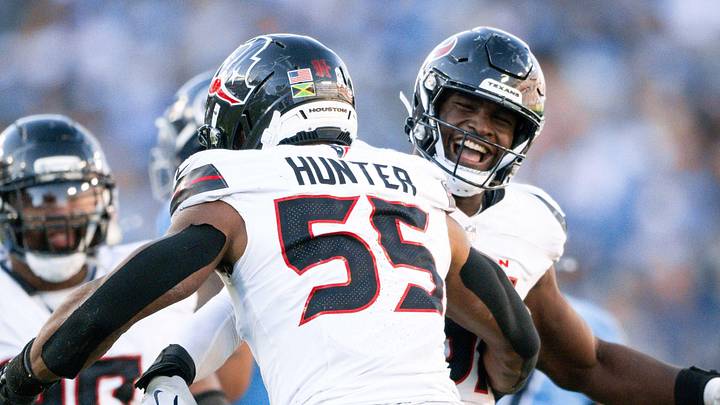 Nov 16, 2025; Nashville, Tennessee, USA;  Houston Texans defensive end Will Anderson Jr. (51) celebrates with defensive end Danielle Hunter (55) after his sack of Tennessee Titans quarterback Cameron Ward (1) during the second half at Nissan Stadium. Mandatory Credit: Steve Roberts-Imagn Images