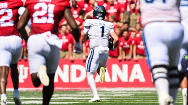 New Wisconsin Badgers quarterback Colton Joseph (1) runs for a touchdown against the Indiana Hoosiers as a member of the Old Dominion Monarchs