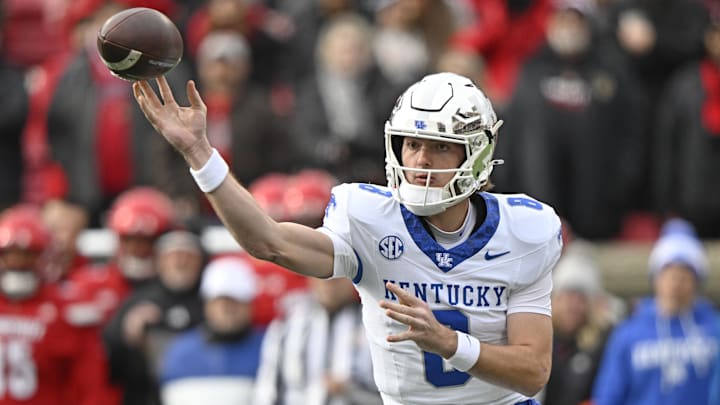 Nov 29, 2025; Louisville, Kentucky, USA;  Kentucky Wildcats quarterback Cutter Boley (8) passes the ball against the Louisville Cardinals during the first quarter at L&N Federal Credit Union Stadium. Mandatory Credit: Jamie Rhodes-Imagn Images