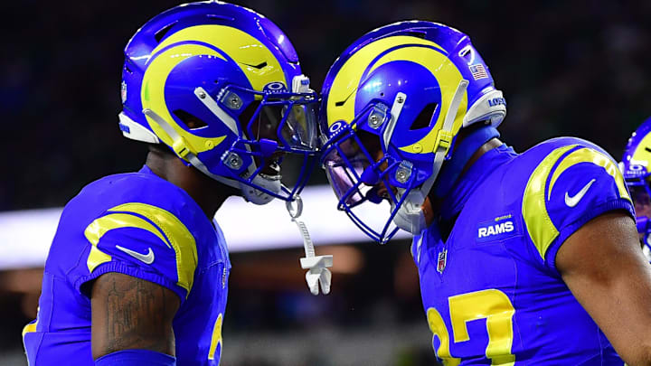 Nov 24, 2024; Inglewood, California, USA; Los Angeles Rams safety Quentin Lake (37) celebrates with Los Angeles Rams safety Quentin Lake (37) after Philadelphia Eagles wide receiver A.J. Brown (11) loses the ball in the endzone during the first half at SoFi Stadium. Mandatory Credit: Gary A. Vasquez-Imagn Images