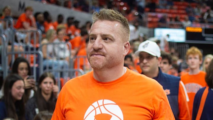 Auburn Tigers football coach Alex Golesh joins the crowd as Auburn Tigers basketball takes on Kentucky Wildcats at Neville Arena in Auburn, Ala. on Saturday, Feb. 21, 2026.