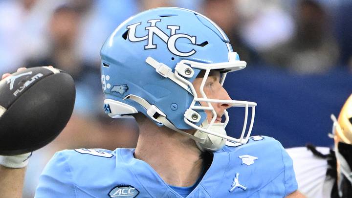 Oct 3, 2026; Chapel Hill, North Carolina, USA; North Carolina Tar Heels quarterback Billy Edwards Jr. (9) looks to pass as Notre Dame Fighting Irish defensive lineman Francis Brewu (7) defends in the first quarter at Kenan Stadium. Mandatory Credit: Bob Donnan-Imagn Images Oct 3, 2026; Chapel Hill, North Carolina, USA; North Carolina Tar Heels quarterback Billy Edwards Jr. (9) looks to pass as Notre Dame Fighting Irish defensive lineman Francis Brewu (7) defends in the first quarter at Kenan Stadium. Mandatory Credit: Bob Donnan-Imagn Images