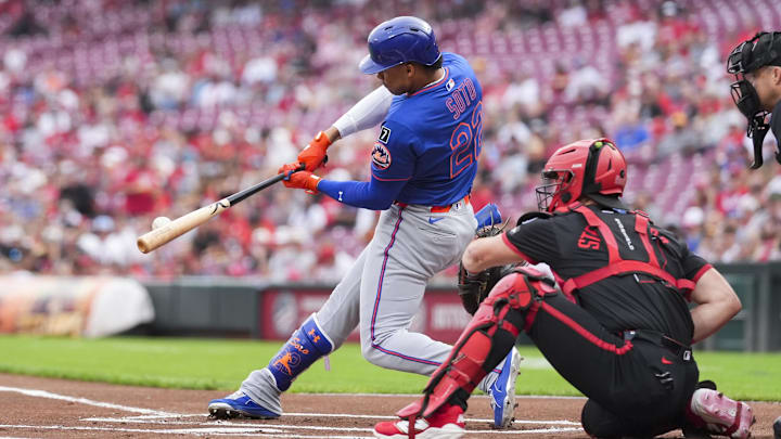 Sep 5, 2025; Cincinnati, Ohio, USA; New York Mets outfielder Juan Soto (22) singles against the Cincinnati Reds in the first inning at Great American Ball Park. 