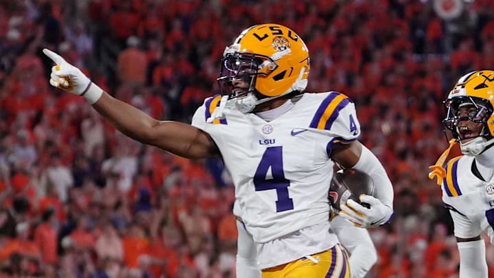 LSU Tigers cornerback Mansoor Delane celebrates with safety after an interception against the Clemson Tigers LSU Tigers cornerback Mansoor Delane celebrates with safety after an interception against the Clemson Tigers