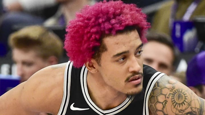 Jan 22, 2026; Salt Lake City, Utah, USA; San Antonio Spurs forward Jeremy Sochan (10) stretches before substituting in during the second half against the Utah Jazz at Delta Center. Mandatory Credit: Peter Creveling-Imagn Images