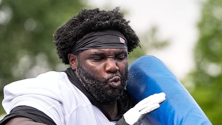 Detroit Lions defensive tackle DJ Reader (98) practices during training camp at team's performance center