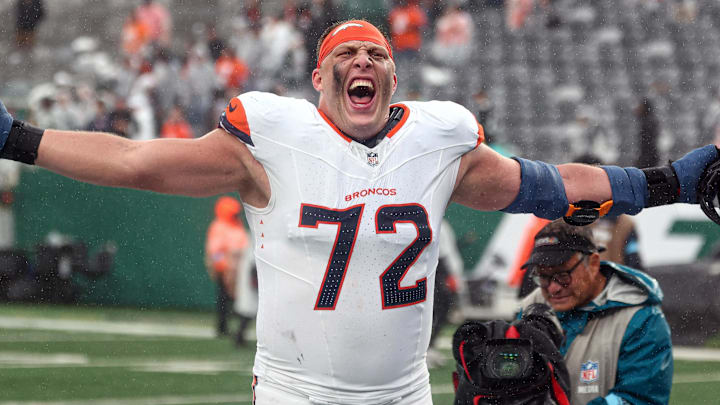 Sep 29, 2024; East Rutherford, New Jersey, USA; Denver Broncos offensive tackle Garett Bolles (72) celebrates after defeating the New York Jets at MetLife Stadium. Mandatory Credit: Vincent Carchietta-Imagn Images