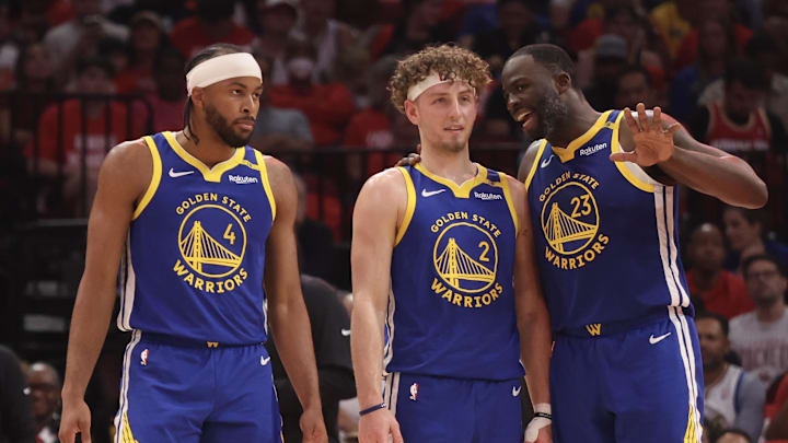 Apr 30, 2025; Houston, Texas, USA; Golden State Warriors forward Draymond Green (23) talks to guard Brandin Podziemski (2) and guard Moses Moody (4) before playing against the Houston Rockets in the second quarter during game five of first round for the 2025 NBA Playoffs at Toyota Center. Mandatory Credit: Thomas Shea-Imagn Images Apr 30, 2025; Houston, Texas, USA; Golden State Warriors forward Draymond Green (23) talks to guard Brandin Podziemski (2) and guard Moses Moody (4) before playing against the Houston Rockets in the second quarter during game five of first round for the 2025 NBA Playoffs at Toyota Center. Mandatory Credit: Thomas Shea-Imagn Images