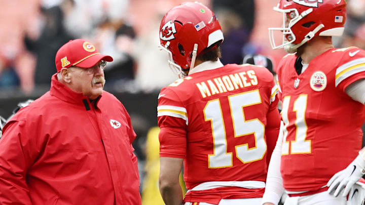 Dec 15, 2024; Cleveland, Ohio, USA; Kansas City Chiefs head coach Andy Reid talks to quarterback Patrick Mahomes (15) before the game between the Cleveland Browns and the Chiefs at Huntington Bank Field. Mandatory Credit: Ken Blaze-Imagn Images