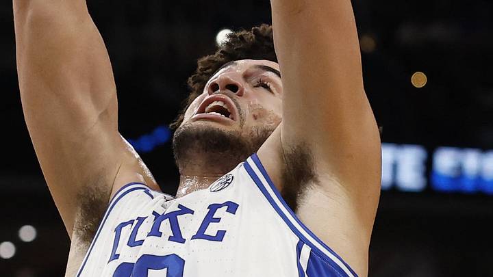 Mar 29, 2026; Washington, DC, USA; Duke Blue Devils forward Cameron Boozer (12) rebounds against the UConn Huskies during an Elite Eight game of the East Regional of the men's 2026 NCAA Tournament at Capital One Arena. Mandatory Credit: Geoff Burke-Imagn Images Mar 29, 2026; Washington, DC, USA; Duke Blue Devils forward Cameron Boozer (12) rebounds against the UConn Huskies during an Elite Eight game of the East Regional of the men's 2026 NCAA Tournament at Capital One Arena. Mandatory Credit: Geoff Burke-Imagn Images