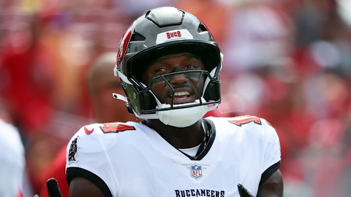 Sep 8, 2024; Tampa, Florida, USA; Tampa Bay Buccaneers wide receiver Chris Godwin (14) looks on against the Washington Commanders works out prior to the game at Raymond James Stadium. Mandatory Credit: Kim Klement Neitzel-Imagn Images