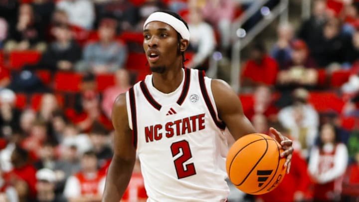 Jan 27, 2026; Raleigh, North Carolina, USA; NC State Wolfpack guard Jr. Paul McNeil (2) dribbles the ball during the first half of the game against the Syracuse Orange at Lenovo Center. Mandatory Credit: Jaylynn Nash-Imagn Images