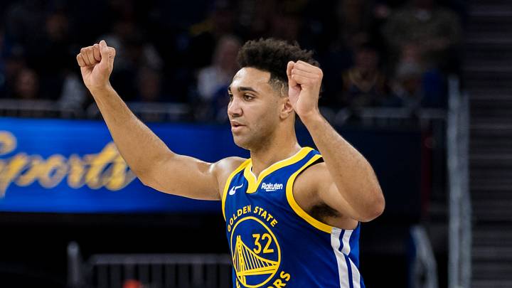 Jan 4, 2024; San Francisco, California, USA; Golden State Warriors center Trayce Jackson-Davis (32) reacts the team scored against the Denver Nuggets during the first half at Chase Center. Mandatory Credit: John Hefti-USA TODAY Sports