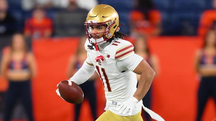 Nov 29, 2025; Syracuse, New York, USA; Boston College Eagles wide receiver Lewis Bond (11) runs against the Syracuse Orange during the second half at the JMA Wireless Dome. Mandatory Credit: Rich Barnes-Imagn Images