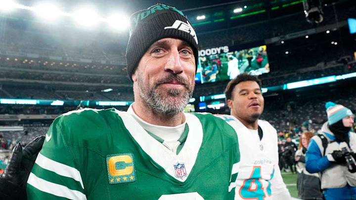 Former New York Jets quarterback Aaron Rodgers (8).