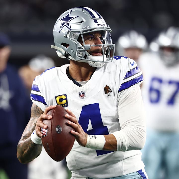 Dallas Cowboys quarterback Dak Prescott warms up before a game against the Minnesota Vikings at AT&T Stadium.