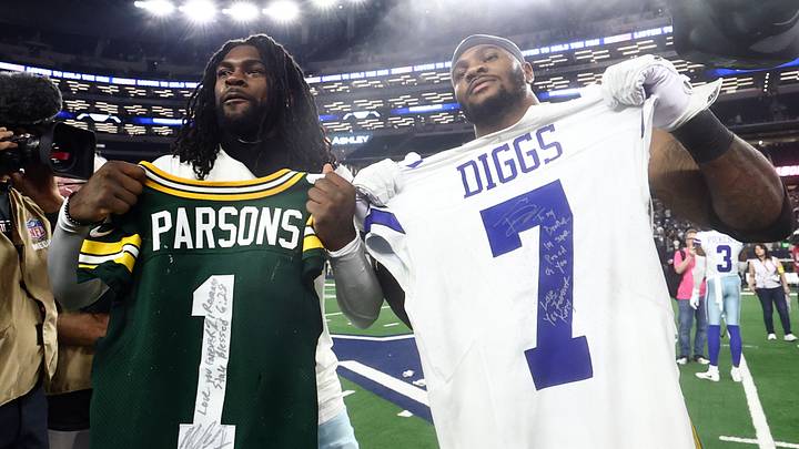 Green Bay Packers defensive end Micah Parsons (1) and former Dallas Cowboys cornerback Trevon Diggs (7) exchange jerseys Green Bay Packers defensive end Micah Parsons (1) and former Dallas Cowboys cornerback Trevon Diggs (7) exchange jerseys