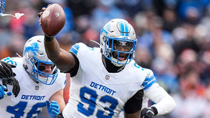 Detroit Lions defensive end Josh Paschal (93) celebrates a fumble recovery against Chicago Bears 
