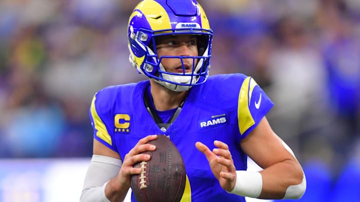 Jan 4, 2026; Inglewood, California, USA;  Los Angeles Rams quarterback Matthew Stafford (9) looks downfield against the Arizona Cardinals during the second half at SoFi Stadium. Mandatory Credit: Gary A. Vasquez-Imagn Images