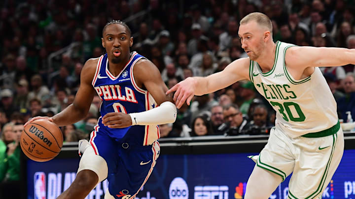 Apr 19, 2026; Boston, Massachusetts, USA; Philadelphia 76ers guard Tyrese Maxey (0) controls the ball while Boston Celtics forward Sam Hauser (30) defends in the first half during game one of the first round of the 2026 NBA Playoffs at TD Garden. Mandatory Credit: Bob DeChiara-Imagn Images
