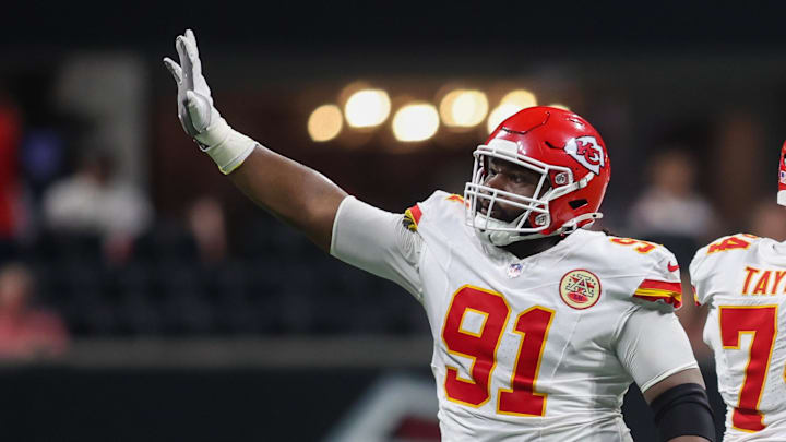 Sep 22, 2024; Atlanta, Georgia, USA; Kansas City Chiefs defensive tackle Derrick Nnadi (91) waves to the crowd after a stop on fourth down against the Atlanta Falcons in the fourth quarter at Mercedes-Benz Stadium. Mandatory Credit: Brett Davis-Imagn Images