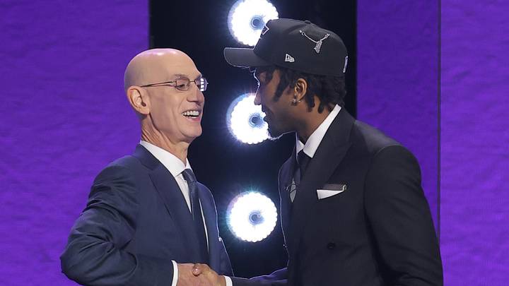 Jun 23, 2026; New York, NY, USA; NBA commissioner Adam Silver greets the second pick in the 2026 NBA draft, Kansas guard Darryn Peterson after he was selected by the Utah Jazz at Barclays Center. Mandatory Credit: Brad Penner-Imagn Images