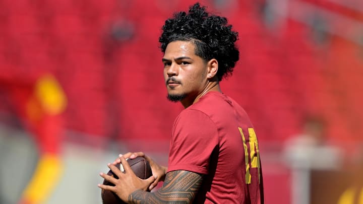 Sep 6, 2025; Los Angeles, California, USA;  USC Trojans quarterback Jayden Maiava (14) warms up prior to the game against the Georgia Southern Eagles at United Airlines Field at Los Angeles Memorial Coliseum. Mandatory Credit: Jayne Kamin-Oncea-Imagn Images