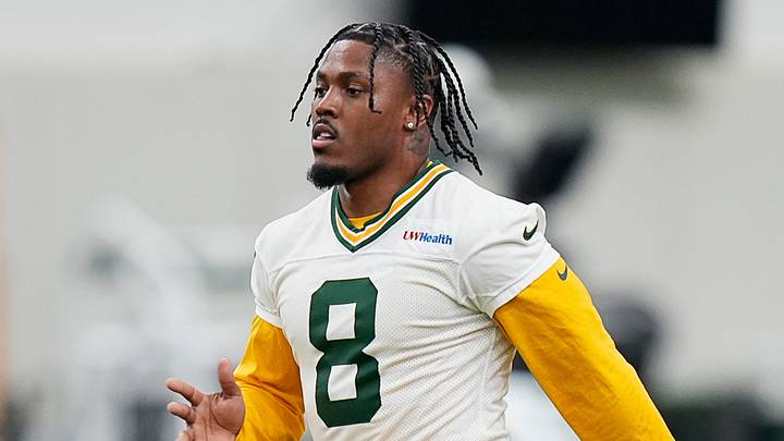 Green Bay Packers running back Josh Jacobs (8) warms up