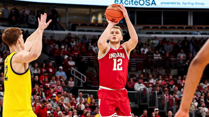 Indiana senior forward Tucker DeVries attempts a jump shot Nov. 9, 2025, against Marquette at the United Center in Chicago.