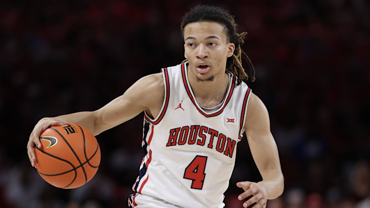 Houston Cougars guard Kingston Flemings (4) dribbles against Baylor Bears in the first half at Fertitta Center.