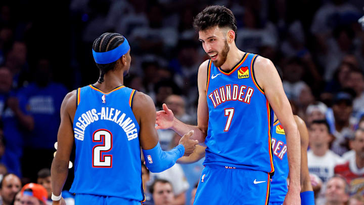 Oklahoma City Thunder forward Chet Holmgren, right, and guard Shai Gilgeous-Alexander celebrate during their Game 5 win.