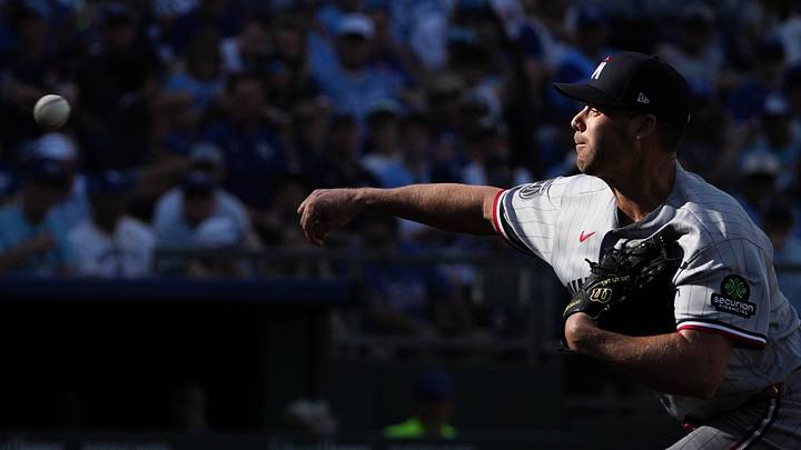 Mar 30, 2026; Kansas City, Missouri, USA; Minnesota Twins pitcher Justin Topa (48) delivers a pitch against the Kansas City Royals during the eighth inning at Kauffman Stadium. Mandatory Credit: Denny Medley-Imagn Images