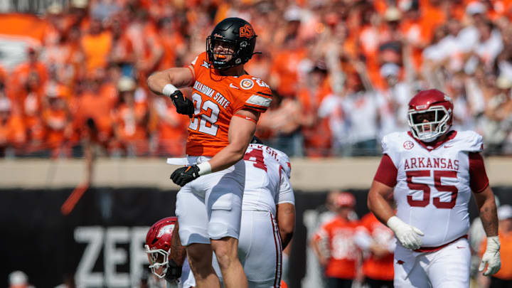 Sep 7, 2024; Stillwater, Oklahoma, USA; Oklahoma State Cowboys linebacker Jeff Roberson (22) reacts after a sack during the first quarter against the Arkansas Razorbacks at Boone Pickens Stadium. Mandatory Credit: William Purnell-Imagn Images Sep 7, 2024; Stillwater, Oklahoma, USA; Oklahoma State Cowboys linebacker Jeff Roberson (22) reacts after a sack during the first quarter against the Arkansas Razorbacks at Boone Pickens Stadium. Mandatory Credit: William Purnell-Imagn Images