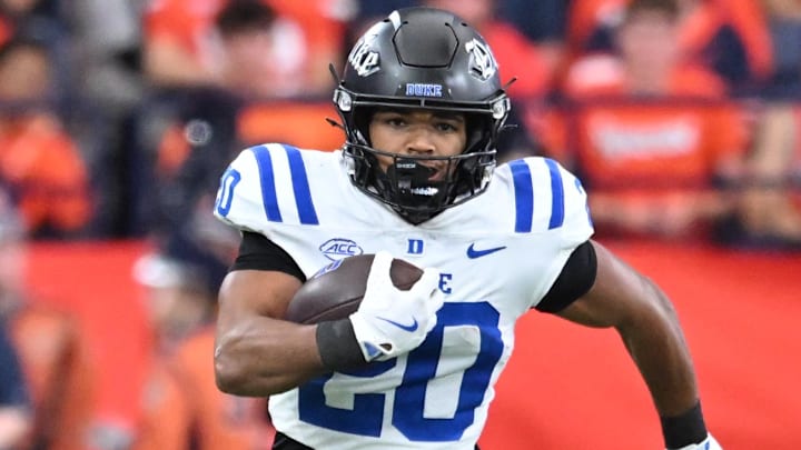 Sep 27, 2025; Syracuse, New York, USA; Duke Blue Devils running back Nate Sheppard (20) carries the ball in the second quarter against the Syracuse Orange at the JMA Wireless Dome. Mandatory Credit: Mark Konezny-Imagn Images