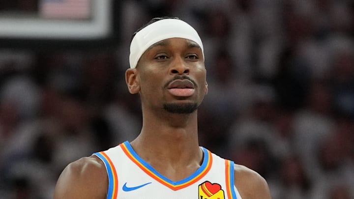 May 26, 2025; Minneapolis, Minnesota, USA; Oklahoma City Thunder guard Shai Gilgeous-Alexander (2) dribbles the ball against the Minnesota Timberwolves in the first half during game four of the western conference finals for the 2025 NBA Playoffs at Target Center. Mandatory Credit: Jesse Johnson-Imagn Images
