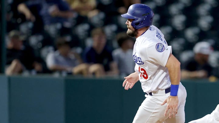 Oklahoma City Dodgers outfielder David Dahl (13) rounds the bases on the way to a score in the second inning during the PCL Championship Series baseball game between the Oklahoma City Dodgers and the Round Rock Express at the Chickasaw Bricktown Ballpark in Oklahoma City, Tuesday, Sept. 26, 2023. Oklahoma City Dodgers outfielder David Dahl (13) rounds the bases on the way to a score in the second inning during the PCL Championship Series baseball game between the Oklahoma City Dodgers and the Round Rock Express at the Chickasaw Bricktown Ballpark in Oklahoma City, Tuesday, Sept. 26, 2023.
