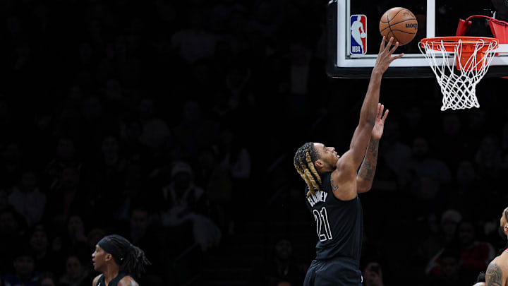 Feb 9, 2026; Brooklyn, New York, USA; Brooklyn Nets forward Noah Clowney (21) scores a basket against the Chicago Bulls during the first quarter at Barclays Center. Mandatory Credit: Vincent Carchietta-Imagn Images