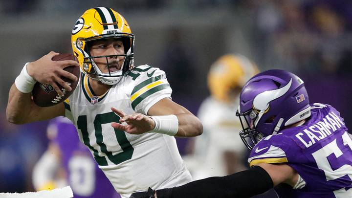 Green Bay Packers quarterback Jordan Love (10) is tackled by Minnesota Vikings linebacker Blake Cashman in 2024. Green Bay Packers quarterback Jordan Love (10) is tackled by Minnesota Vikings linebacker Blake Cashman in 2024.