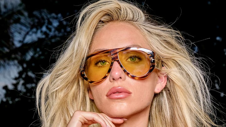 Alix Earle was photographed by Yu Tsai in Mexico. Sunglasses by Tom Ford.