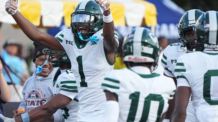 Cass Tech WR Mylan Griggs celebrates after scoring a touchdown against Michigan City during the first half of the Amazon Prep Kickoff Classic at Wayne State University in Detroit, Friday, August 28, 2026. Tech will face Grandville Thursday night. Cass Tech WR Mylan Griggs celebrates after scoring a touchdown against Michigan City during the first half of the Amazon Prep Kickoff Classic at Wayne State University in Detroit, Friday, August 28, 2026. Tech will face Grandville Thursday night.