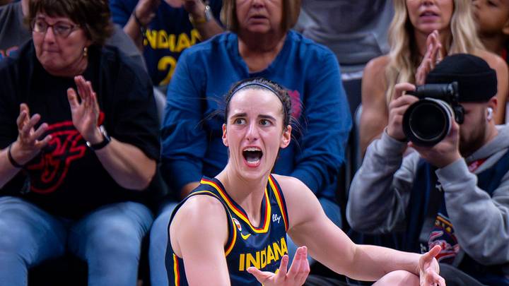Indiana Fever guard Caitlin Clark (22) reacts to no call