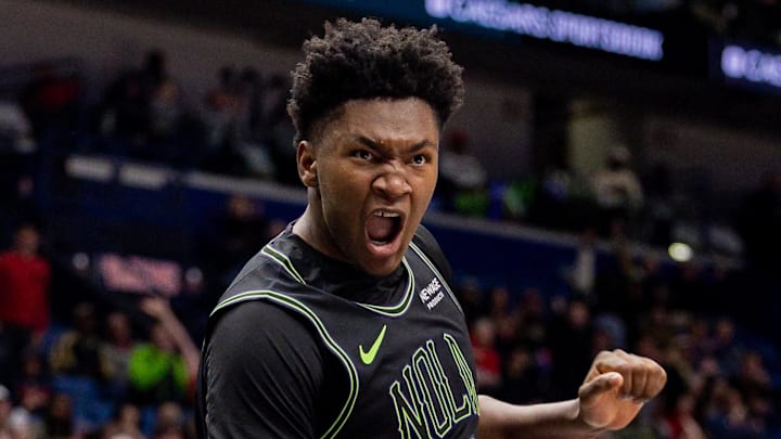 Dec 11, 2025; New Orleans, Louisiana, USA; New Orleans Pelicans center Derik Queen (22) snugs the ball against Portland Trail Blazers forward Kris Murray (24) during the second half at Smoothie King Center. Mandatory Credit: Stephen Lew-Imagn Images Dec 11, 2025; New Orleans, Louisiana, USA; New Orleans Pelicans center Derik Queen (22) snugs the ball against Portland Trail Blazers forward Kris Murray (24) during the second half at Smoothie King Center. Mandatory Credit: Stephen Lew-Imagn Images
