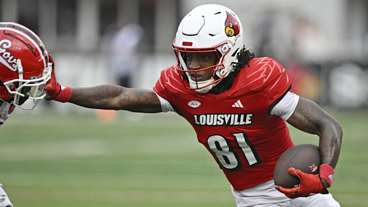 Aug 31, 2024; Louisville, Kentucky, USA;  Louisville Cardinals wide receiver Cataurus Hicks (81) runs the ball against the Austin Peay Governors during the second quarter at L&N Federal Credit Union Stadium.
