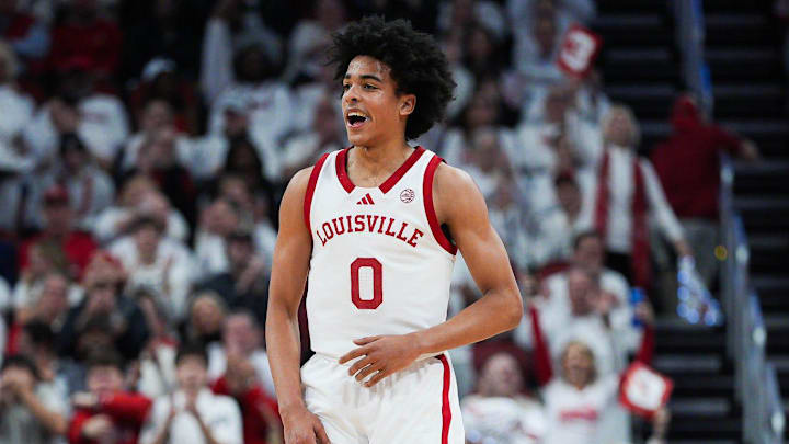 Louisville Cardinals guard Mikel Brown Jr. (0) celebrates after hitting a three-point goal against NC State at the KFC Yum! Center in downtown Louisville February 9, 2026.