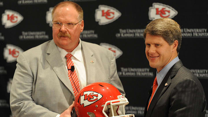 January 07, 2013; Kansas City, MO, USA; Newly hired Kansas City Chiefs head coach Andy Reid (left) and chairman Clark Hunt pose for photos during the press conference at Arrowhead Stadium. Mandatory Credit: Denny Medley-Imagn Images January 07, 2013; Kansas City, MO, USA; Newly hired Kansas City Chiefs head coach Andy Reid (left) and chairman Clark Hunt pose for photos during the press conference at Arrowhead Stadium. Mandatory Credit: Denny Medley-Imagn Images