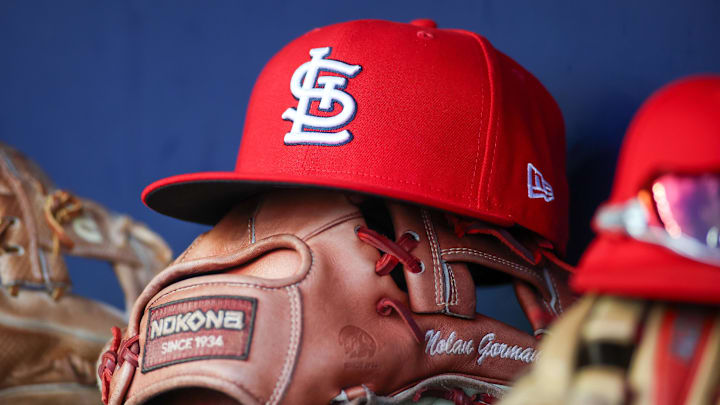 Sep 5, 2023; Atlanta, Georgia, USA; A detailed view of the hat and glove of St. Louis Cardinals second baseman Nolan Gorman (not pictured) before a game against the Atlanta Braves at Truist Park. 