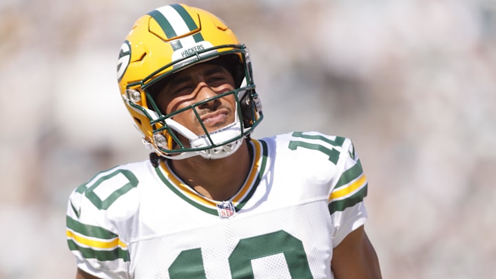 Green Bay Packers quarterback Jordan Love (10) reacts after an injury against the Jacksonville Jaguars during the second quarter at EverBank Stadium.
